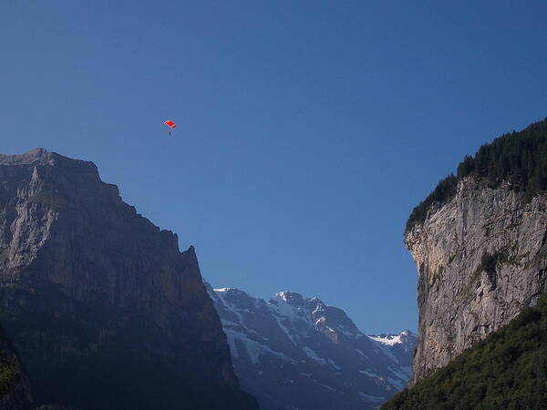 Skydiver Poster featuring the photograph Skydiver over Lauterbrunnen by Nina Kindred