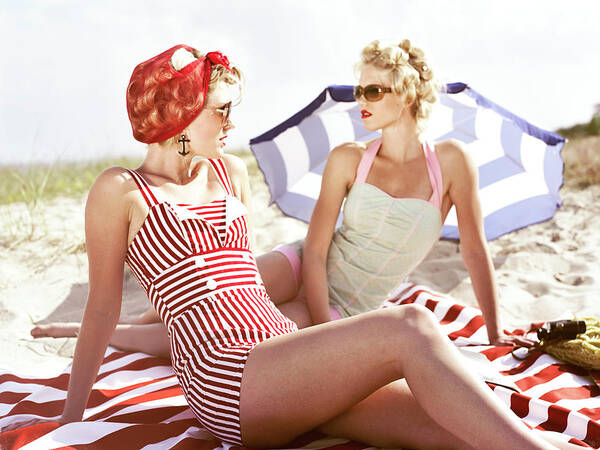 Three Quarter Length Poster featuring the photograph Two Retro Young Women On Beach by Johner Images