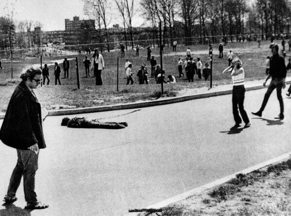 History Poster featuring the photograph A Student Lies Dead At Kent State by Everett