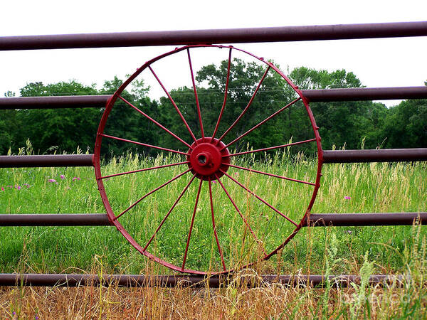 Wildflowers Poster featuring the photograph Texas Wildflowers Through Wagon Wheel by Kathy White