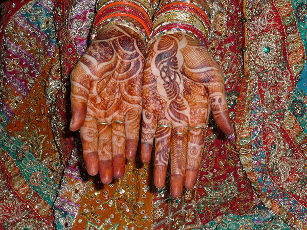 Clothes Poster featuring the photograph The wonderfully decorated hands and clothes of an Indian bride by Ashish Agarwal