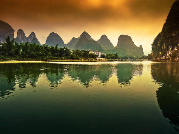 Sunset Poster featuring the photograph Tranquil evening reflection-China Guilin scenery-Lijiang River in Yangshuo by Artto Pan