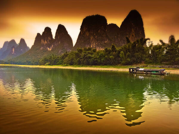 Sunset Poster featuring the photograph Boat Breaks Tranquil Evening Reflection-China Guilin scenery Lijiang River in Yangshuo by Artto Pan