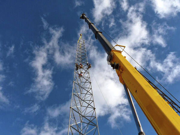 Tower Steel Crane Boom Rigging Climber Climbing Technicians Workers Industry Sky Blue Clouds Safety Osha Fall Protection Cell Cellphone Cellular Hydraulics Erection Lifting Antenna Communications Clear Spring Maryland Usa Tower Technician Rope Work Ropes Aerial High Harness Poster featuring the photograph Clear Spring by Bob Geary