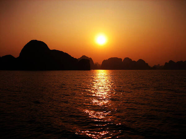 Orange Poster featuring the photograph Ha Long Bay Sunset by Oliver Johnston