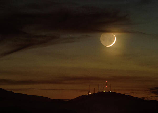 Moon Poster featuring the photograph Moonset over Signal Hill by Janis Knight