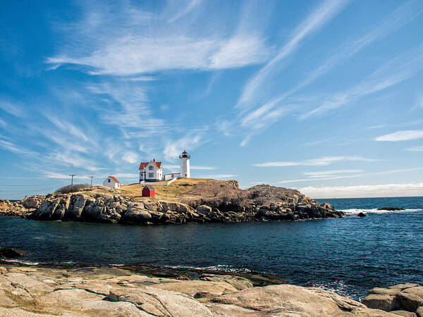Maine Poster featuring the photograph Nubble Lighthouse with Dramatic Clouds by Nancy De Flon