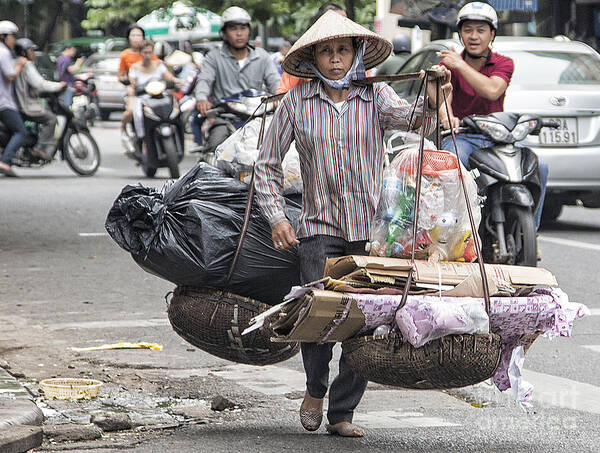 Vietnam Poster featuring the photograph One woman street life Hanoi by Chuck Kuhn