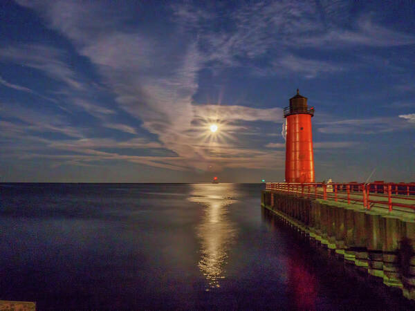 Llake Michigan Poster featuring the photograph Supermoon over the red lighthouse by Kristine Hinrichs