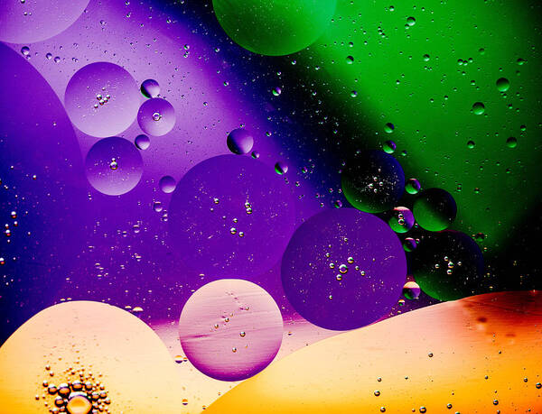 Oil And Water Image Macro Closeup Purple Green Space Poster featuring the photograph The far Side Moons by Bruce Pritchett