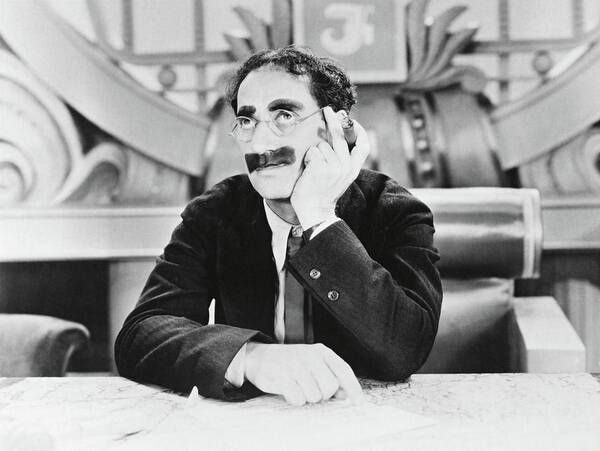 Groucho Marx Poster featuring the photograph GROUCHO MARX in DUCK SOUP -1933-. by Album