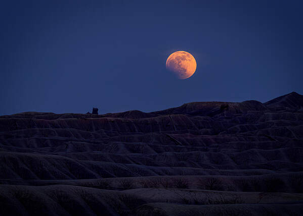 Badland Poster featuring the photograph Lunar Eclipse At Badland by Liguang Huang