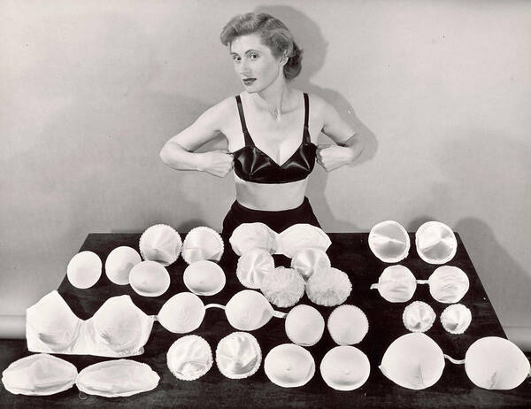 Clothing Poster featuring the photograph Model demonstrating bras by Bernard Hoffman