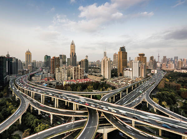 Built Structure Poster featuring the photograph Shanghai Skyline And Busy Road by Martin Puddy