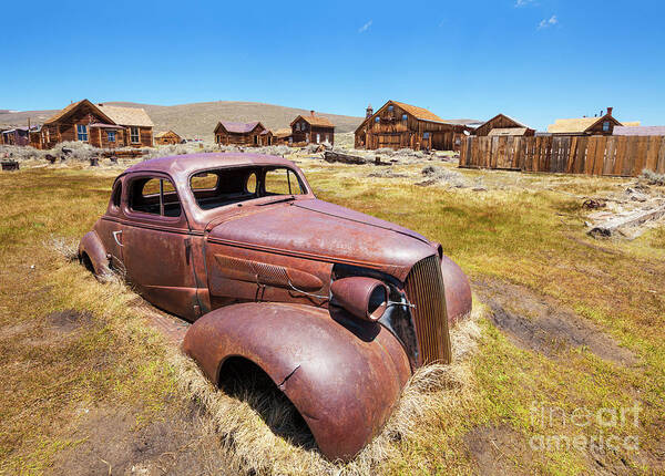 Bodie Poster featuring the photograph Bodie ghost town,1937 Chevrolet coupe, California by Neale And Judith Clark