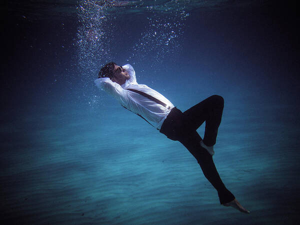 Underwater Poster featuring the photograph Fashion Man by Gemma Silvestre