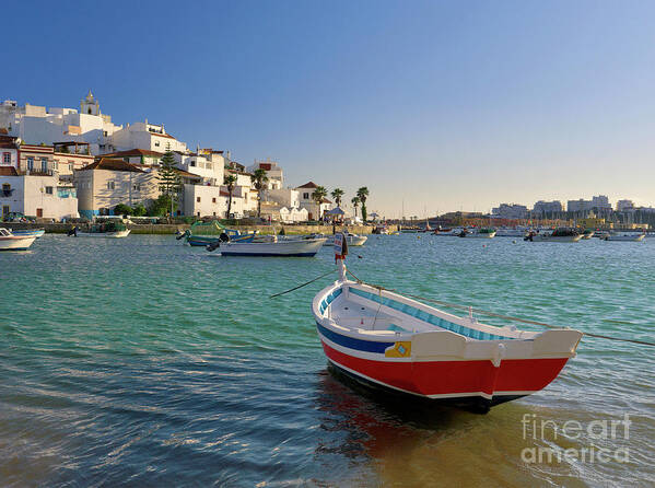 Portugal Poster featuring the photograph Ferragudo with a red fishing boat, Portugal by Mikehoward Photography