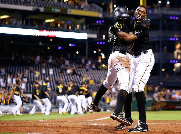 People Poster featuring the photograph Francisco Cervelli and Gregory Polanco by Jared Wickerham
