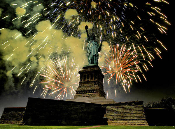 Statue Of Liberty Poster featuring the photograph Statue of Liberty with fire works by Montez Kerr
