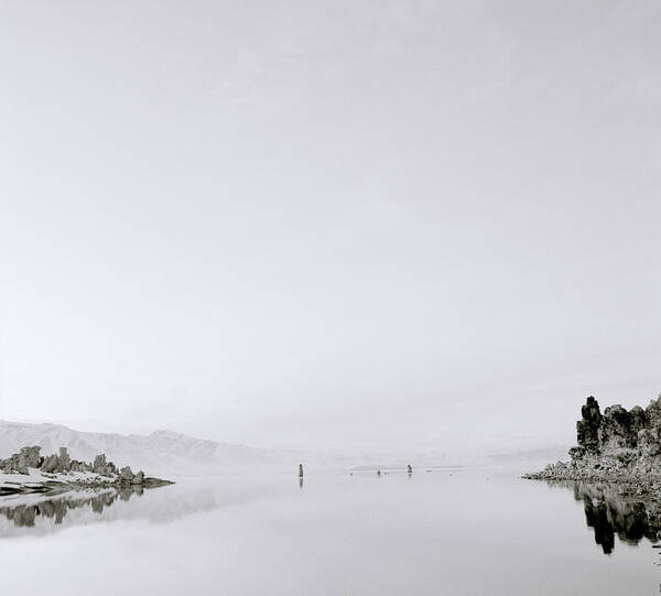 Escapism Poster featuring the photograph Still Waters Of Mono Lake In America by Shaun Higson