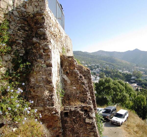 Rock Poster featuring the photograph Built Solid Rock Hilltop in Mijas Spain by John Shiron