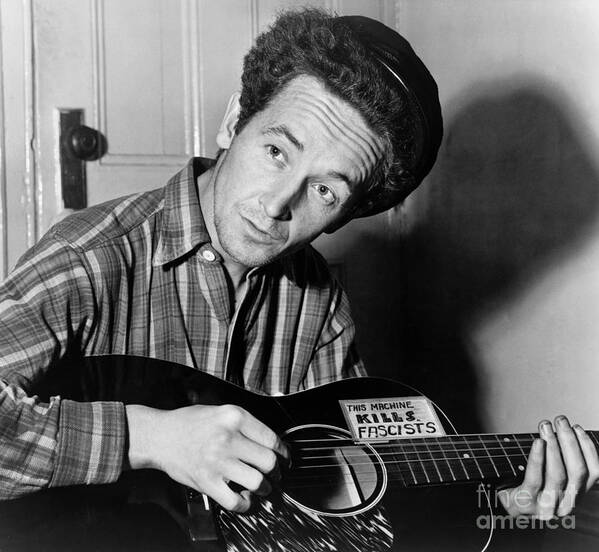 1943 Poster featuring the photograph Woody Guthrie (1912-1967) by Granger