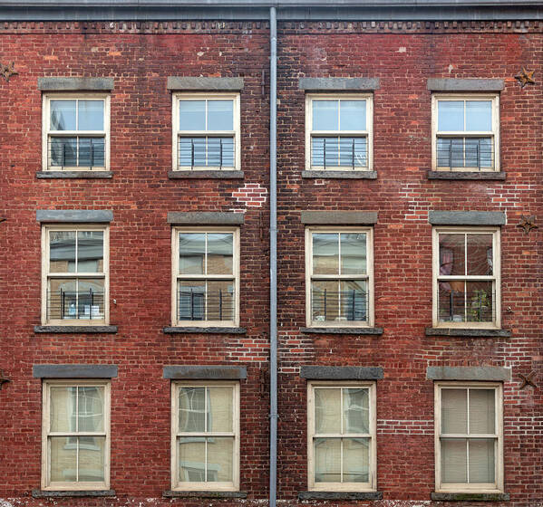 Red Brick Poster featuring the photograph Windows on Front Street by Cate Franklyn