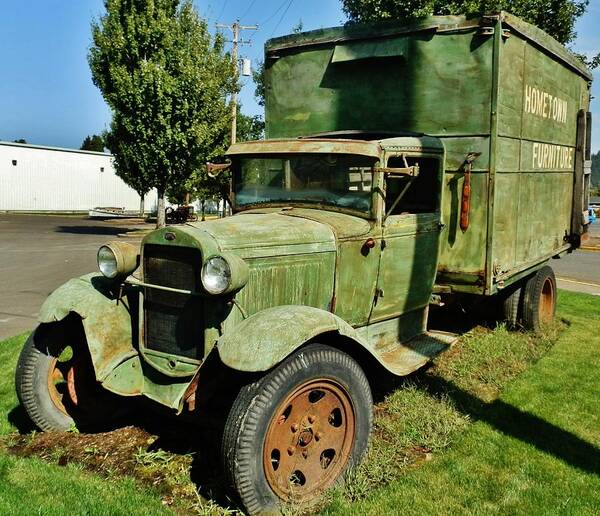 1920's (but Poster featuring the photograph 1920s FORD Moving truck by VLee Watson