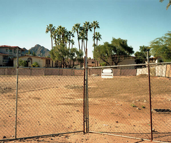 Arizona Poster featuring the photograph An Old Broken Down Gate Keeps People by Todd Korol