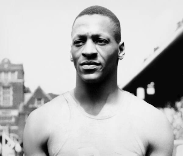 1035-1066 Poster featuring the photograph Portrait of Jesse Owens by Underwood Archives