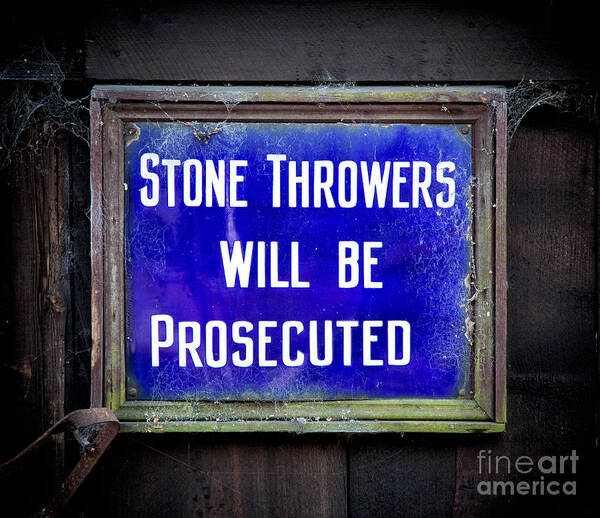 British Poster featuring the photograph Stone Throwers Be Warned by Adrian Evans