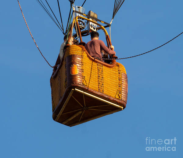 Hot Air Balloon Poster featuring the photograph Hot Air Balloon Basket Against a Bright Blue Sky by L Bosco