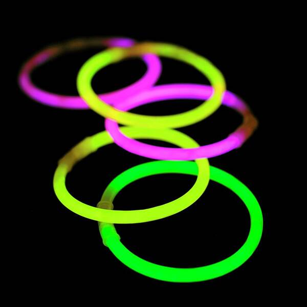 Glow Bracelet Poster featuring the photograph Glow Bracelets #2 by Science Photo Library