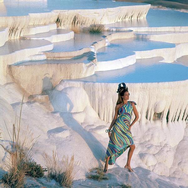 Fashion Poster featuring the photograph A Model On The Cliffs Of Pamukkale by Henry Clarke