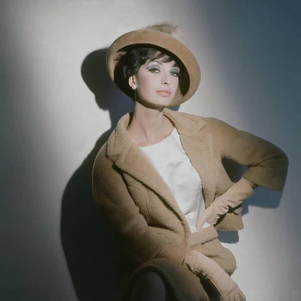 Eye Contact Poster featuring the photograph A Model Wearing A Camel Wool Suit by Horst P. Horst