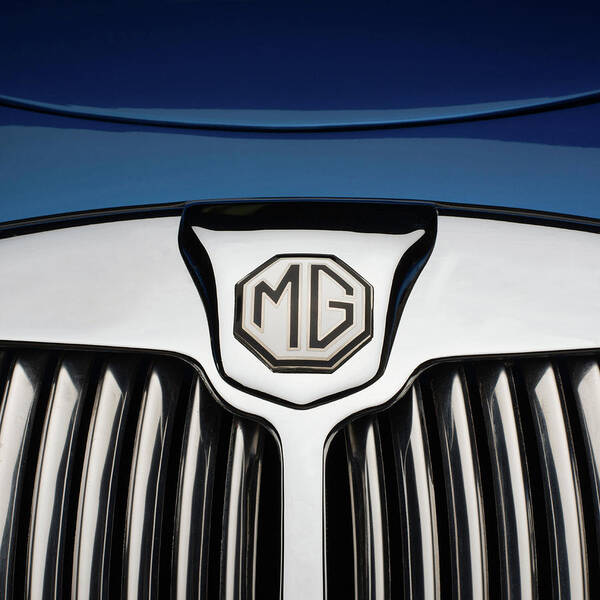 Photography Poster featuring the photograph Chrome Radiator Grill And Badge Of Blue by Panoramic Images
