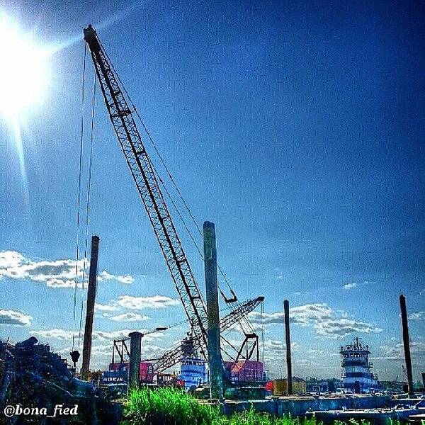 Industrial Poster featuring the photograph Cranes Sleeping Under The Sun by Brian Lyons