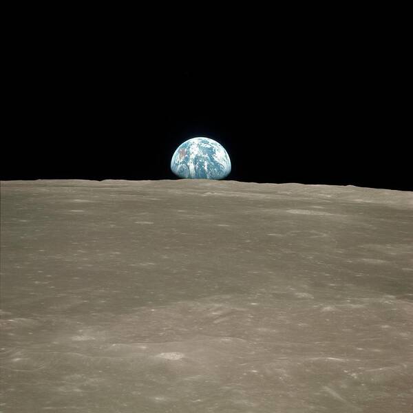 Earth Poster featuring the photograph Earthrise Over Moon by Nasa