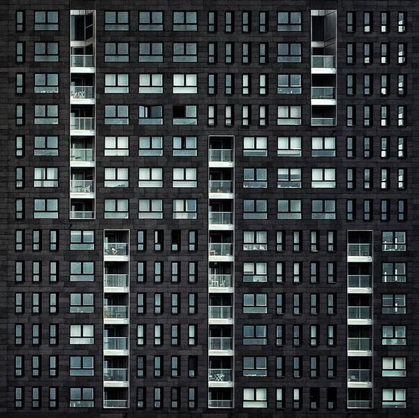 Building Poster featuring the photograph Living In The City by Piet Flour