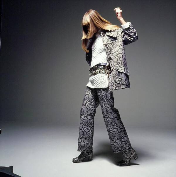 Fashion Poster featuring the photograph Lynn Sutherland Wearing A Kasper Pantsuit by Bert Stern