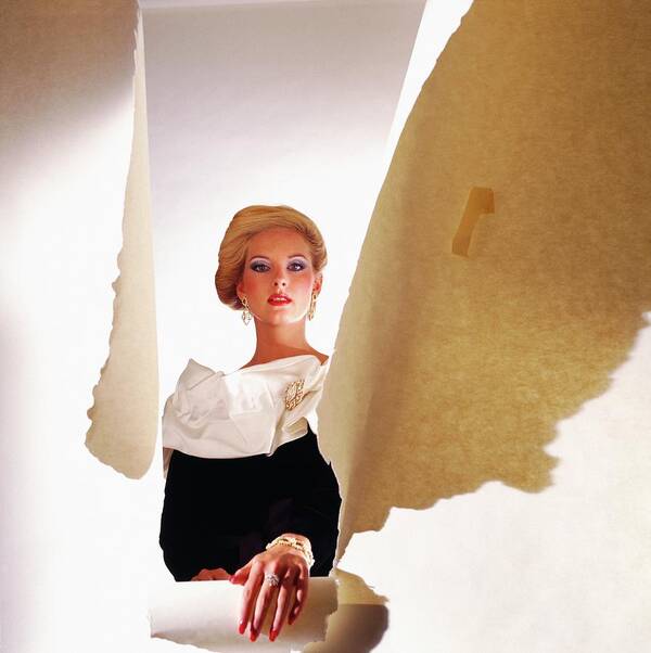 Studio Shot Poster featuring the photograph Model Wearing Satin Collar Behind Ripped Paper by Horst P. Horst
