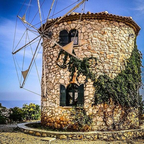 Windmill Poster featuring the photograph Old Stone Windmill In Skinari On The by Alistair Ford