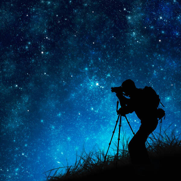 Dark Poster featuring the photograph Silhouette Of Photographer Shooting Stars #1 by Setsiri Silapasuwanchai