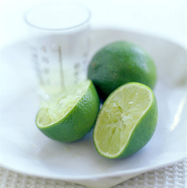 Food Poster featuring the photograph Squeezed Lime by David Munns