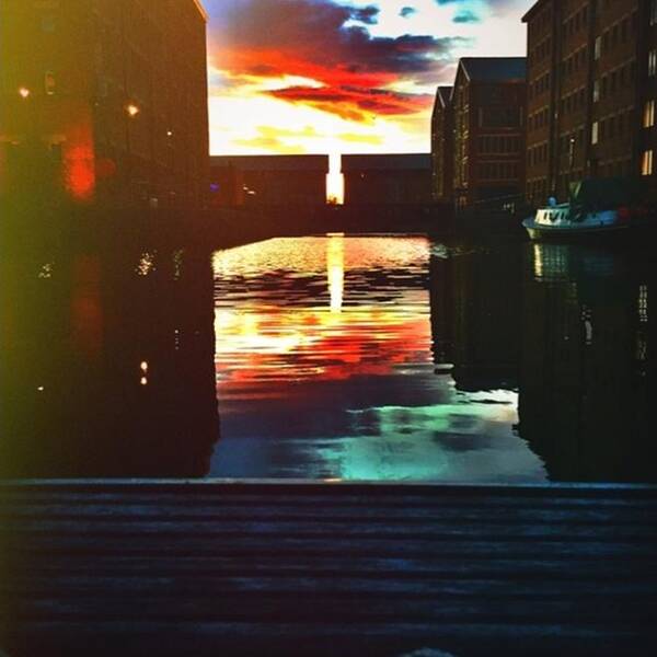 Sunset Poster featuring the photograph Dockland sun down by Trystan Oldfield