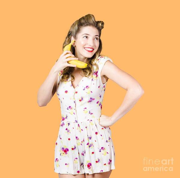 Fruit Poster featuring the photograph Retro pin up girl chatting on banana telephone by Jorgo Photography