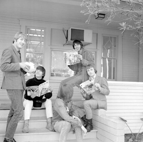 Black Color Poster featuring the photograph Buffalo Springfield On Their Porch #1 by Michael Ochs Archives