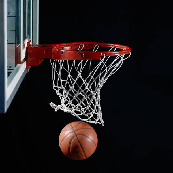 Accuracy Poster featuring the photograph Basketball In Hoop by Ryan Mcvay