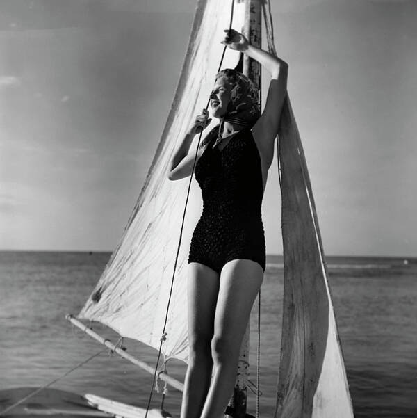 People Poster featuring the photograph Woman On Sailing Boat by George Marks