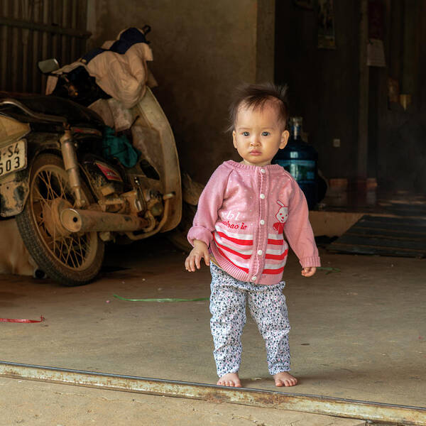 Charming Poster featuring the photograph Charming Baby Girl in Sapa, Vietnam by Dubi Roman